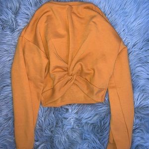 cropped yellow sweatshirt